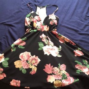 Mini Black dress with pink flower print.